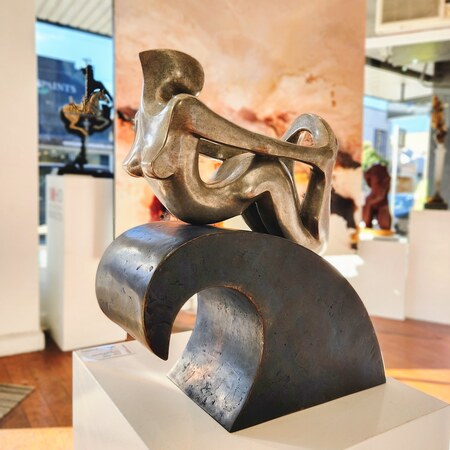 surfer sculpture bronze wave